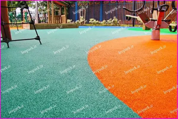 کفپوش گرانولی درجاریز در دو رنگ نارنجی و سبز اجرا شده در فضای بازی